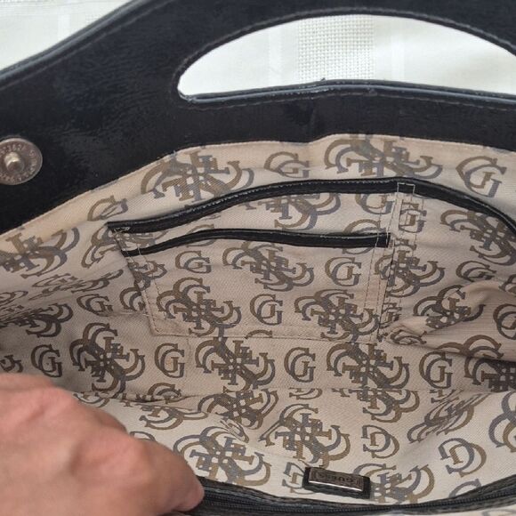 Guess Clutch Black Handbag with Silver Accents - Picture 12 of 16